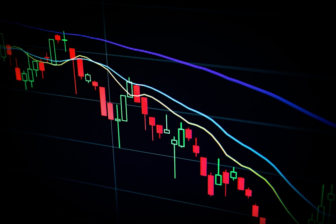 Close-up of a candlestick chart showing stock market fluctuations with colorful lines and bars